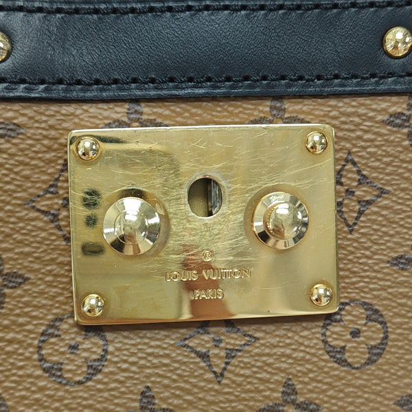TRUNK Monogram Coated Canvas Brown