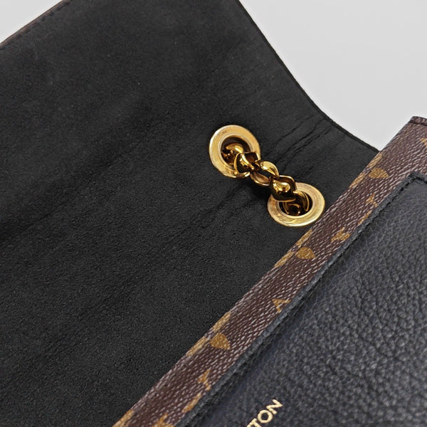 VICTOIRE Monogram Coated Canvas Brown