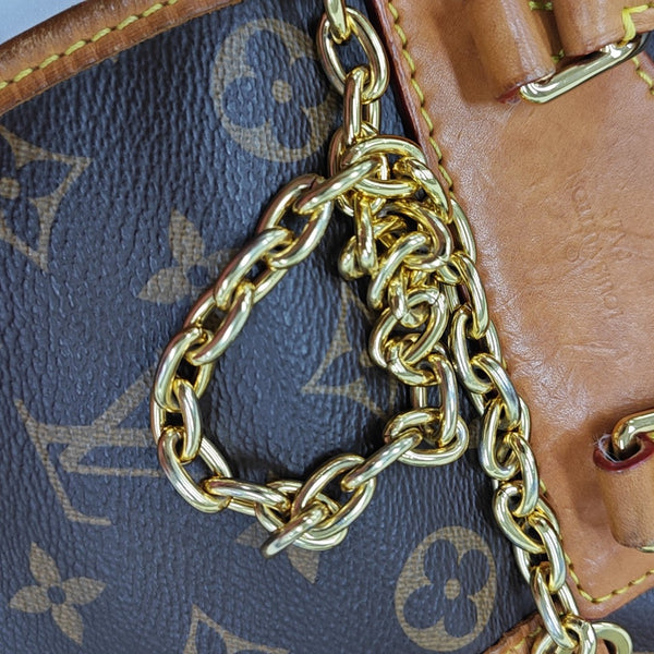 EXCURSION PM Monogram Coated Canvas Brown