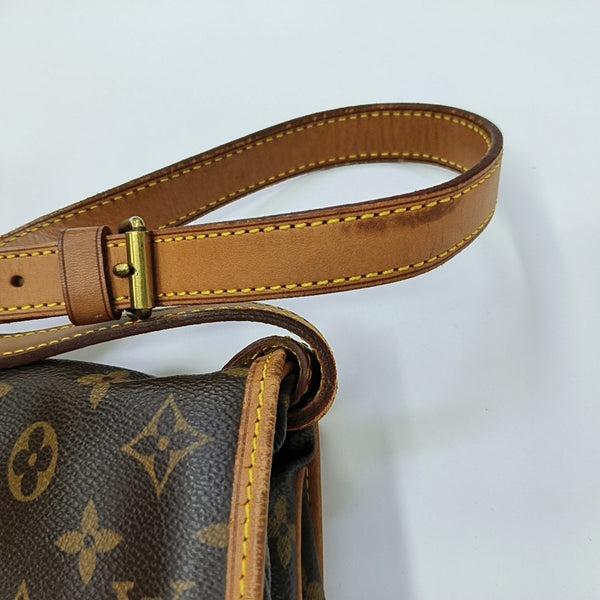 SAUMUR 30 Monogram Coated Canvas Brown