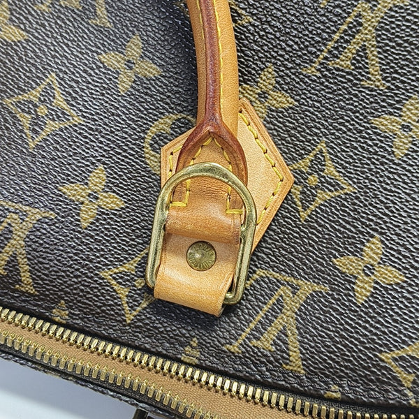 ALMA PM Monogram Coated Canvas Brown