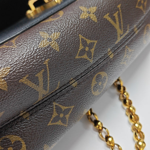 VICTOIRE Monogram Coated Canvas Brown