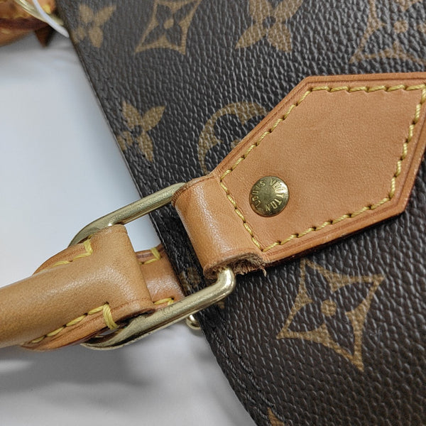 ALMA PM Monogram Coated Canvas Brown