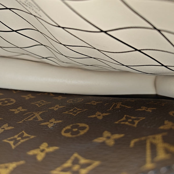 TRUNK Monogram Coated Canvas Brown