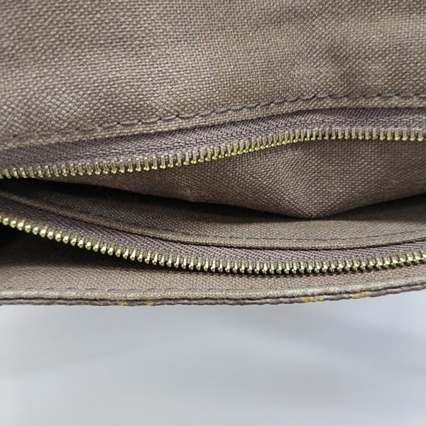 MENILMONTANT PM Monogram Coated Canvas Brown