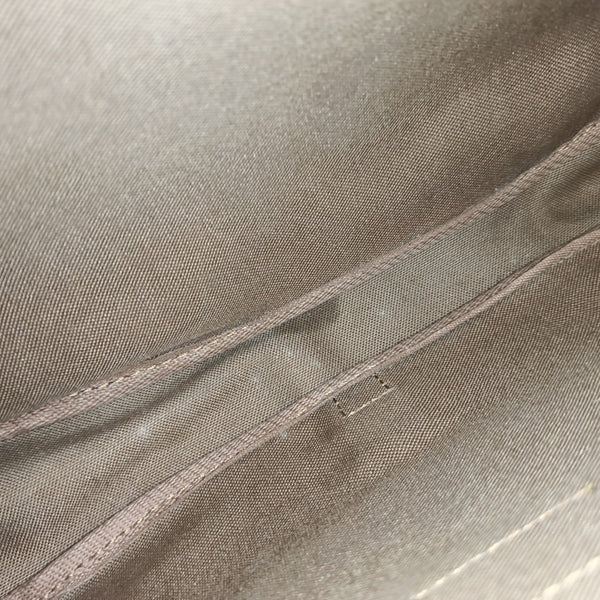 SAUMUR 30 Monogram Coated Canvas Brown
