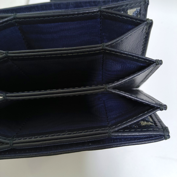 Authenticated pre-owned 30 Montaigne Canvas Blue Card Holder - Card Holder at Looply