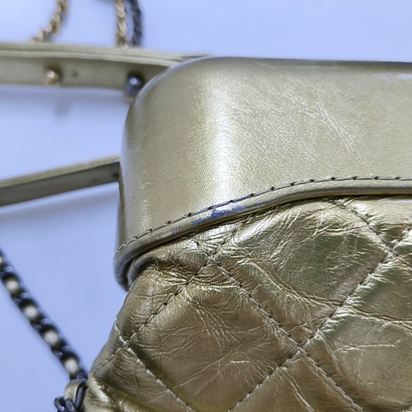 Authenticated pre-owned Gabrielle Small Quilted Calfskin Gold - Crossbody Bag at Looply