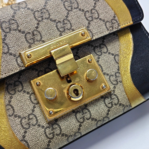 Authenticated pre-owned Padlock Small Monogram Coated Canvas Beige - Shoulder Bag at Looply