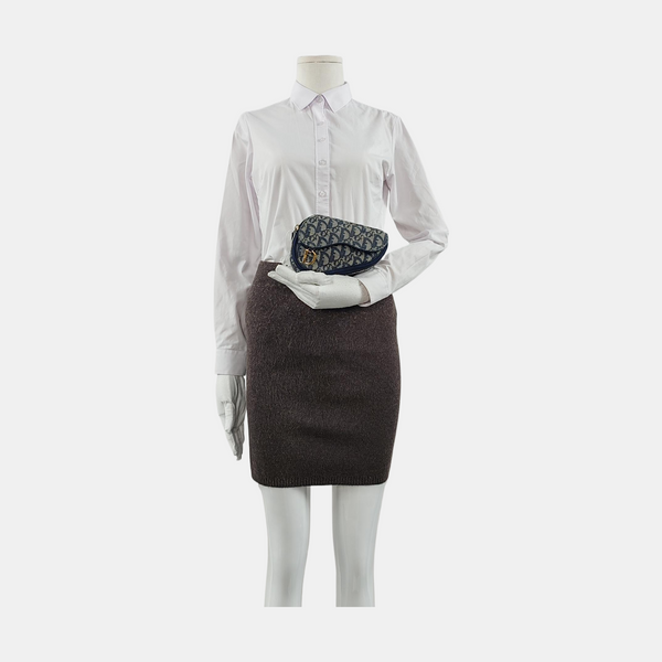 Authenticated pre-owned Saddle Oblique Canvas Blue - Clutch at Looply
