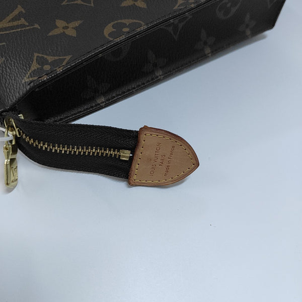 TOILET POCKET 26 Monogram Coated Canvas Brown