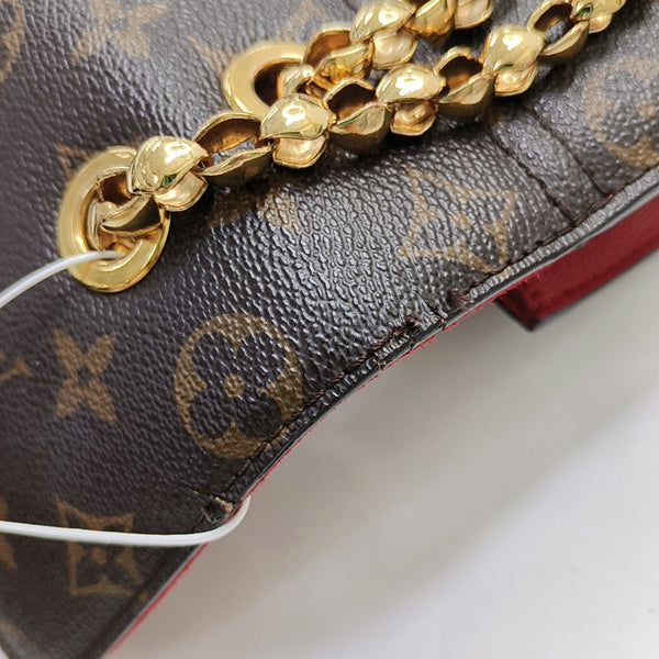VICTOIRE Monogram Coated Canvas Brown