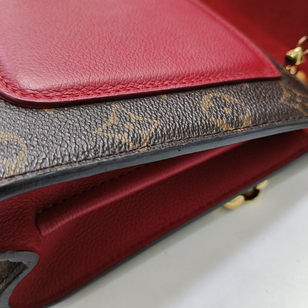 VICTOIRE Monogram Coated Canvas Brown