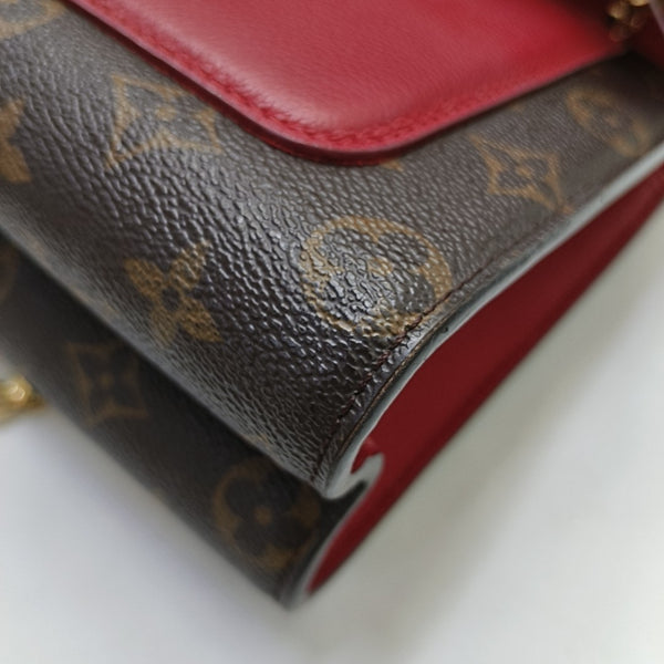 VICTOIRE Monogram Coated Canvas Brown