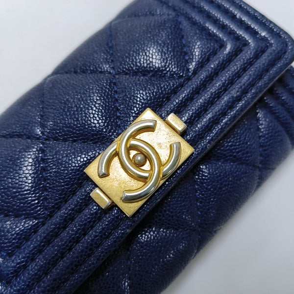 Authenticated pre-owned Boy Chanel Quilted Grained Calfskin Blue Wallet - Wallet at Looply
