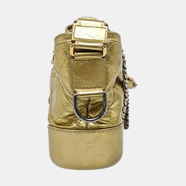 Authenticated pre-owned Gabrielle Small Quilted Calfskin Gold - Crossbody Bag at Looply