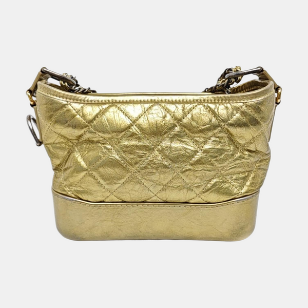 Authenticated pre-owned Gabrielle Small Quilted Calfskin Gold - Crossbody Bag at Looply
