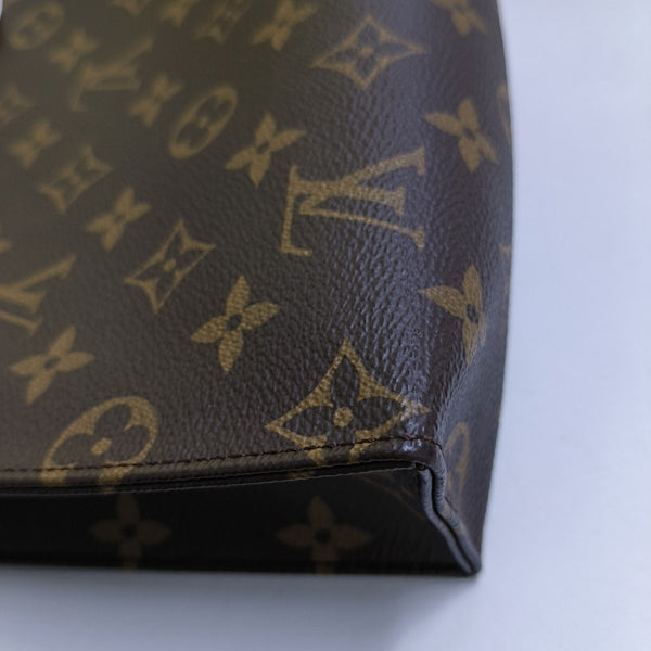TOILET POCKET 26 Monogram Coated Canvas Brown