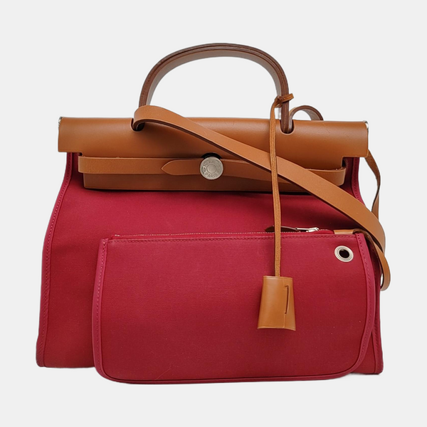 Authenticated pre-owned Herbag 31 Canvas Red - Handbags at Looply