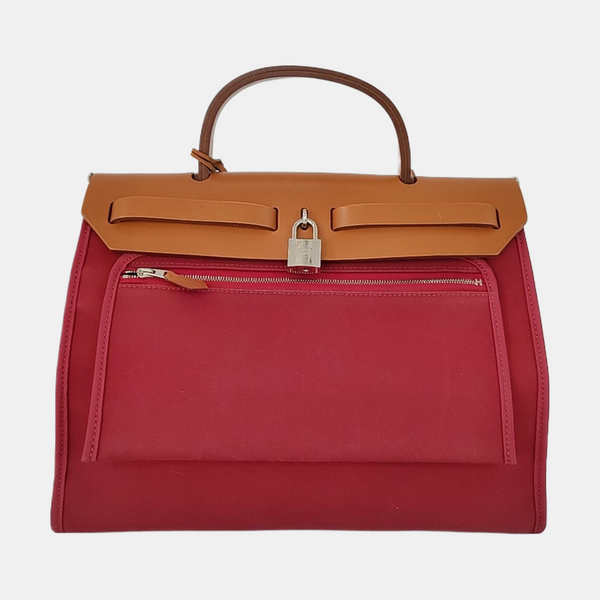 Authenticated pre-owned Herbag 31 Canvas Red - Handbags at Looply