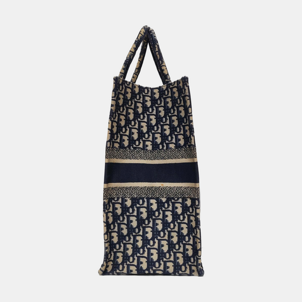 Authenticated pre-owned Book Tote Large Monogram Canvas Blue - Top Handle Bag at Looply