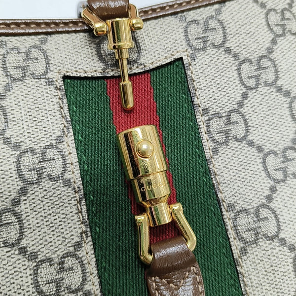 Authenticated pre-owned Jackie 1961 Mini Monogram Coated Canvas Beige - Crossbody Bag at Looply