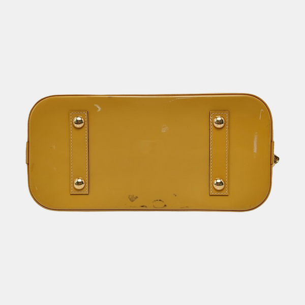 Authenticated pre-owned Alma PM Monogram Patent Leather Yellow - Top Handle Bag at Looply