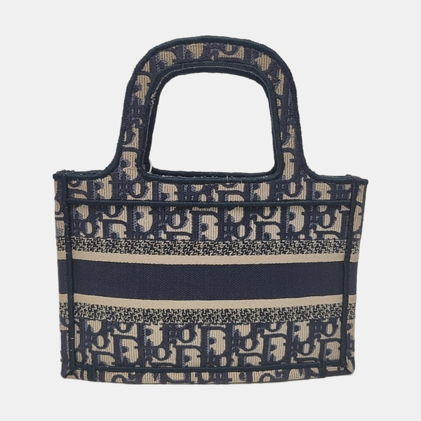Authenticated pre-owned Book Tote Mini Monogram Canvas Blue - Top Handle Bag at Looply