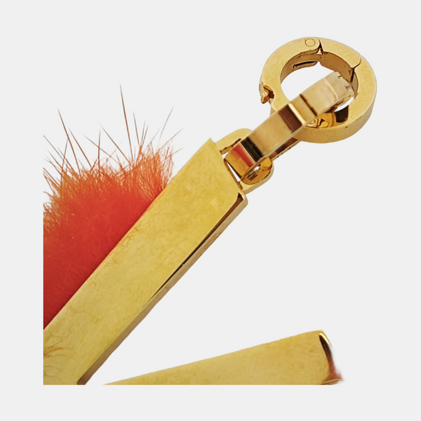 Authenticated pre-owned Gold-tone Metal Bag Charm - Bag Charm at Looply