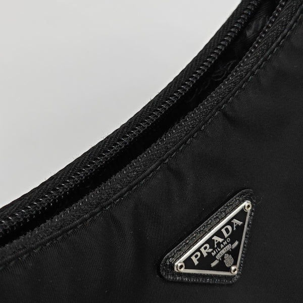 Authenticated pre-owned Re-edition2000 Mini Nylon Black - Top Handle Bag at Looply