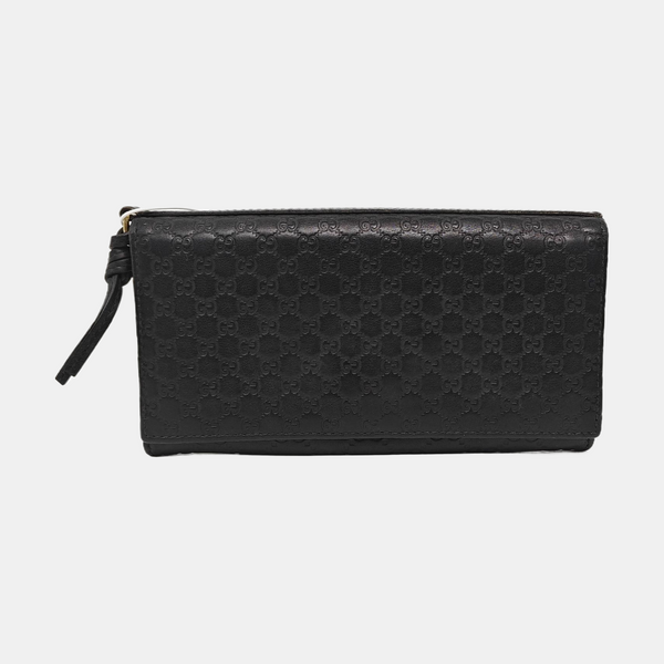 Authenticated pre-owned Microguccissima Monogram Calfskin Black Wallet - Wallet at Looply