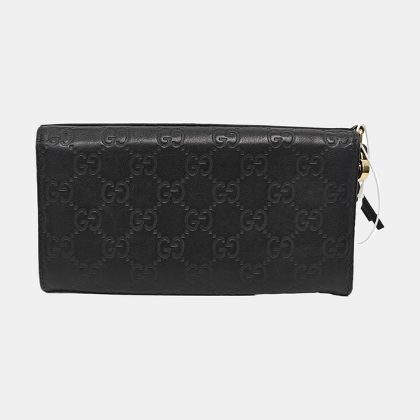 Authenticated pre-owned Microguccissima Monogram Calfskin Black Wallet - Wallet at Looply