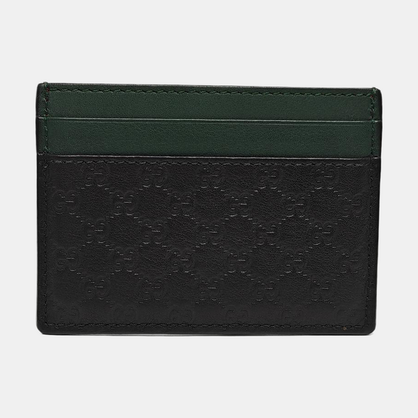 Authenticated pre-owned Microguccissima Monogram Calfskin Black Card Holder - Card Holder at Looply