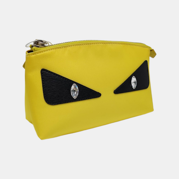 Authenticated pre-owned Monster Nylon Yellow - Clutch at Looply
