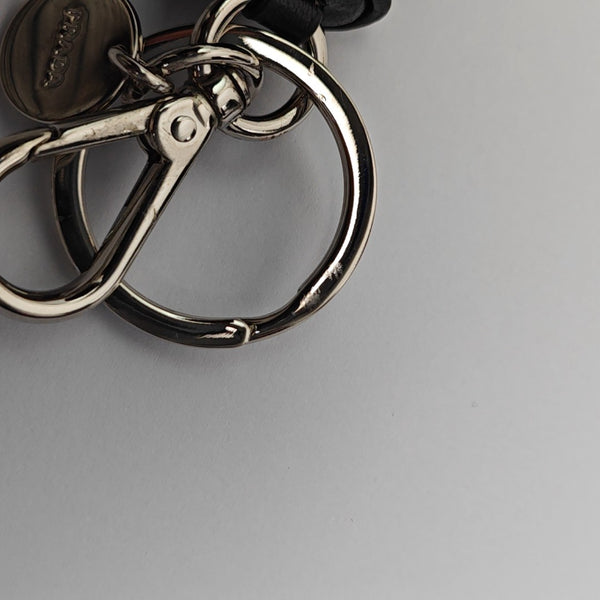 Authenticated pre-owned Leather Black Bag Charm - Bag Charm at Looply