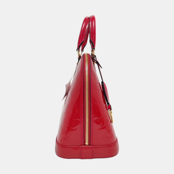 Authenticated pre-owned Alma PM Monogram Calfskin Red - Top Handle Bag at Looply