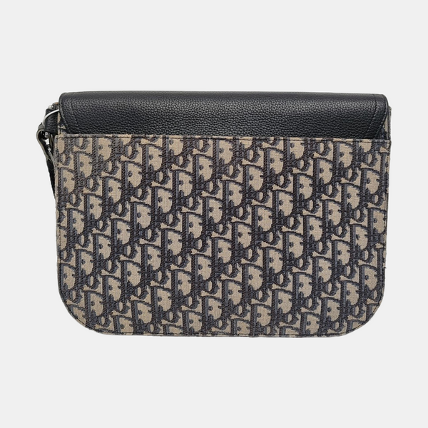 Authenticated pre-owned Saddle Oblique Canvas Beige - Clutch at Looply