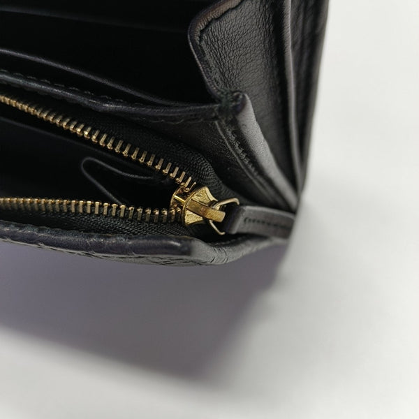 Authenticated pre-owned Microguccissima Monogram Calfskin Black Wallet - Wallet at Looply