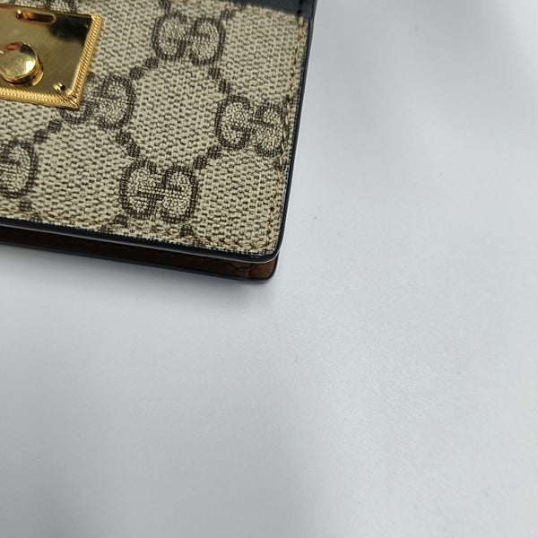 Authenticated pre-owned Padlock Coated Canvas Beige Wallet - Wallet at Looply