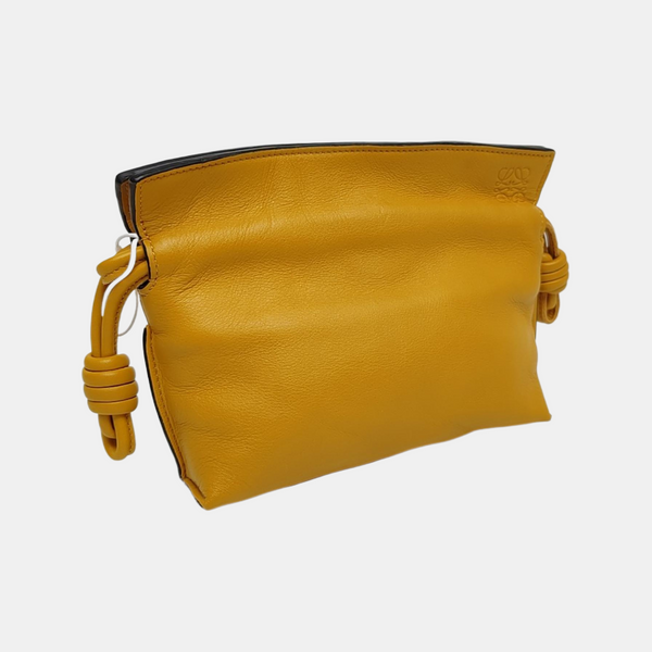 Authenticated pre-owned Flamenco Calfskin Yellow - Clutch at Looply