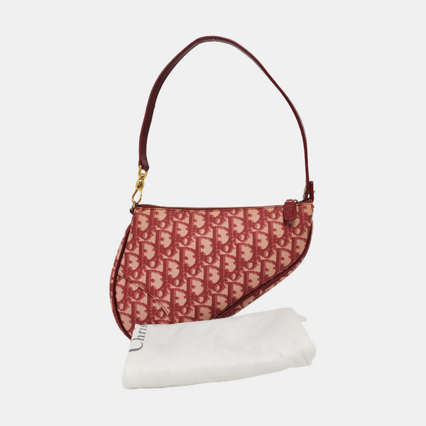 Authenticated pre-owned Saddle Oblique Canvas Red - Top Handle Bag at Looply
