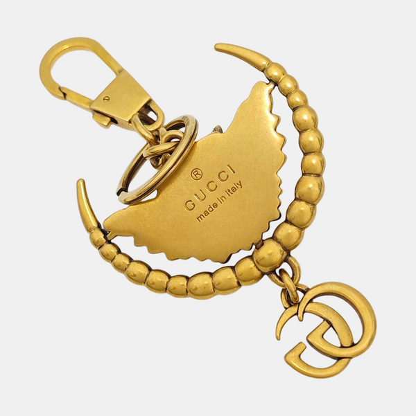 Authenticated pre-owned Gold-tone Metal Bag Charm - Bag Charm at Looply