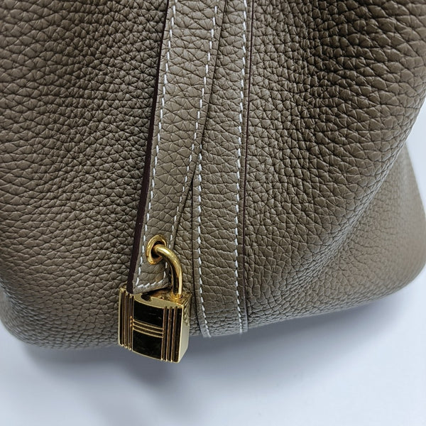 Authenticated pre-owned Picotin Lock 22 Clemence Gray - Top Handle Bag at Looply
