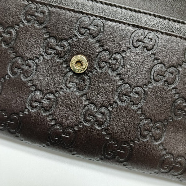 Authenticated pre-owned Microguccissima Monogram Calfskin Brown Wallet - Wallet at Looply