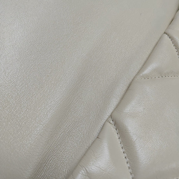 Authenticated pre-owned Chanel 19 Maxi Quilted Lambskin Beige - Shoulder Bag at Looply