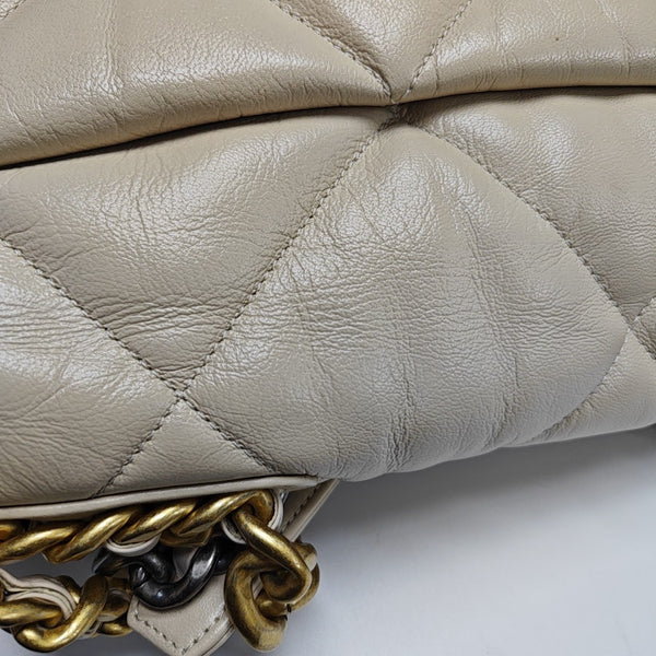Authenticated pre-owned Chanel 19 Maxi Quilted Lambskin Beige - Shoulder Bag at Looply