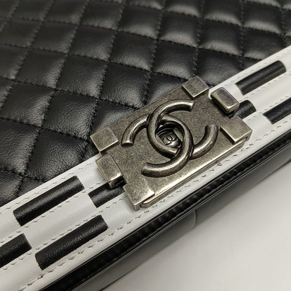 Authenticated pre-owned Boy Chanel Large Quilted Calfskin Black - Crossbody Bag at Looply