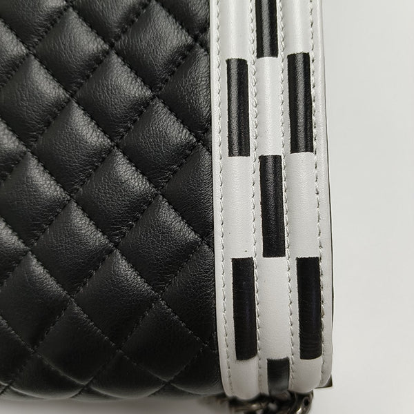 Authenticated pre-owned Boy Chanel Large Quilted Calfskin Black - Crossbody Bag at Looply