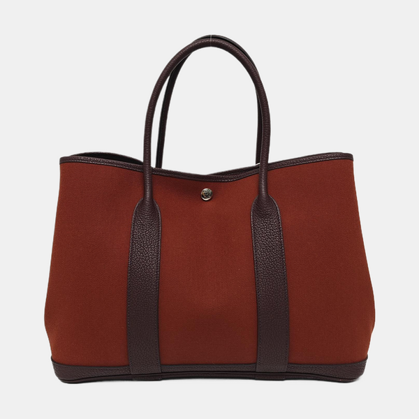 Authenticated pre-owned Garden Party Canvas Red - Top Handle Bag at Looply