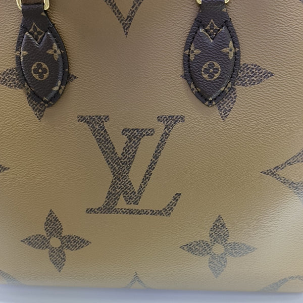 ONTHEGO MM Monogram Coated Canvas Brown